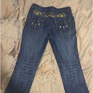 Vintage Fitted Jeans with written designs at the back.